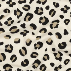 Tissu Sweat molleton motifs Léopard fond milk - Poppy