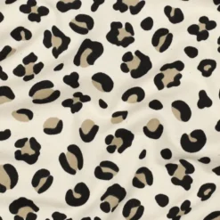 Tissu Sweat molleton motifs Léopard fond milk - Poppy