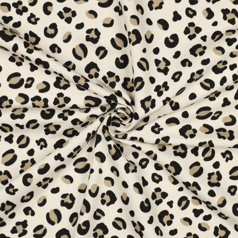Tissu Sweat molleton motifs Léopard fond milk - Poppy