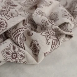 Tissu Sweat Poppy - Motif Paisley marron fond écru