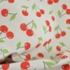 Tissu toile aspect lin – Motif cerises