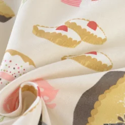 Tissu toile aspect lin motif patisserie et gateaux fond lin