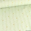 Tissu toile Lurex doré motif branches fond menthe - OEKO TEX