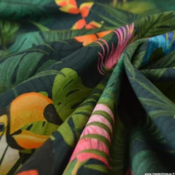 Tissu toile motif tropical perroquets & flamants roses