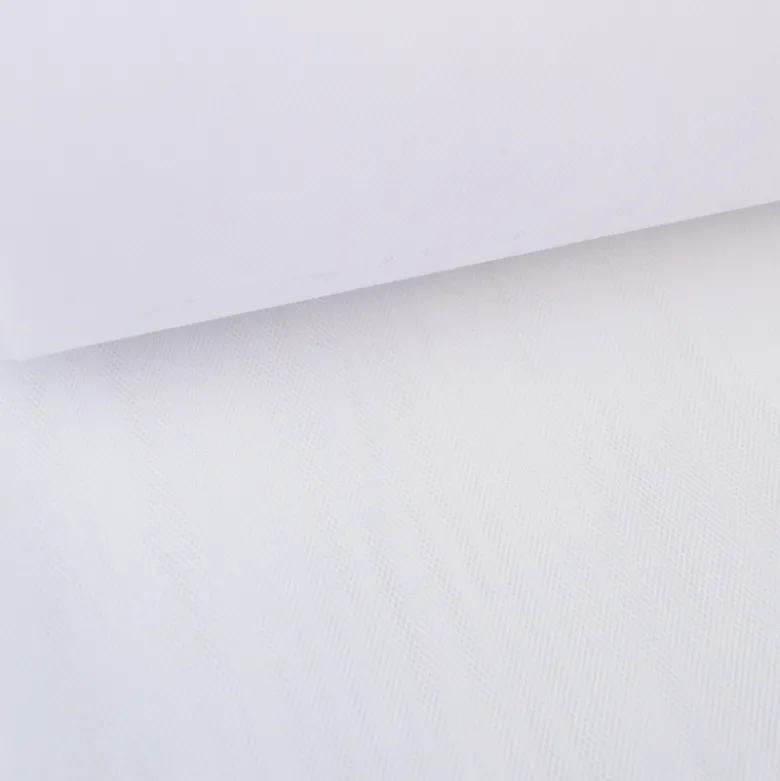 Tissu Tulle raide coloris BLANC 100% polyamide 300cm 27gr/m² .