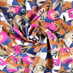 Tissu viscose imprimée Paloma – fleurs graphiques fuchsia, ocre et bleu
