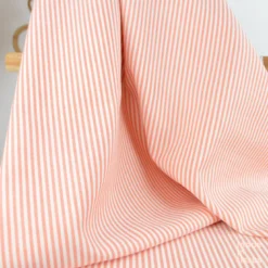Tissu viscose mélangée à rayures tangerine et blanches