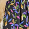 Tissu viscose stretch motif feuillage bleu vert fond noir