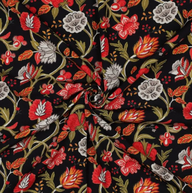 Tissu viscose stretch motif fleurs rouges fond noir