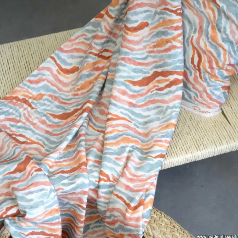 Tissu viscose Stretch motif zebré skin fond écru
