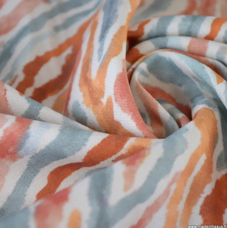 Tissu viscose Stretch motif zebré skin fond écru