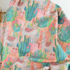 Tissu voile de coton motif cactus et lamas - corail