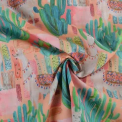 Tissu voile de coton motif cactus et lamas - corail