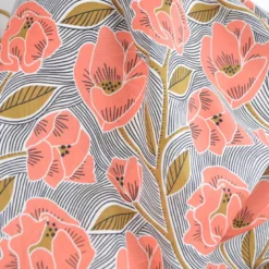 Tissu voile de coton motif fleurs corail et ocre fond rayé