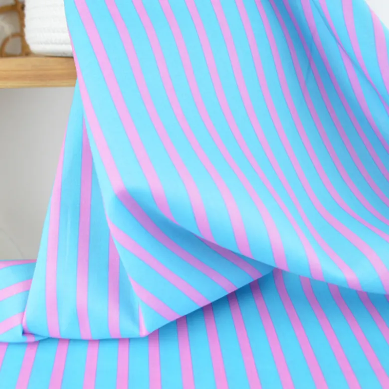 Tissu voile de coton Rudayan à rayures rose fond turquoise