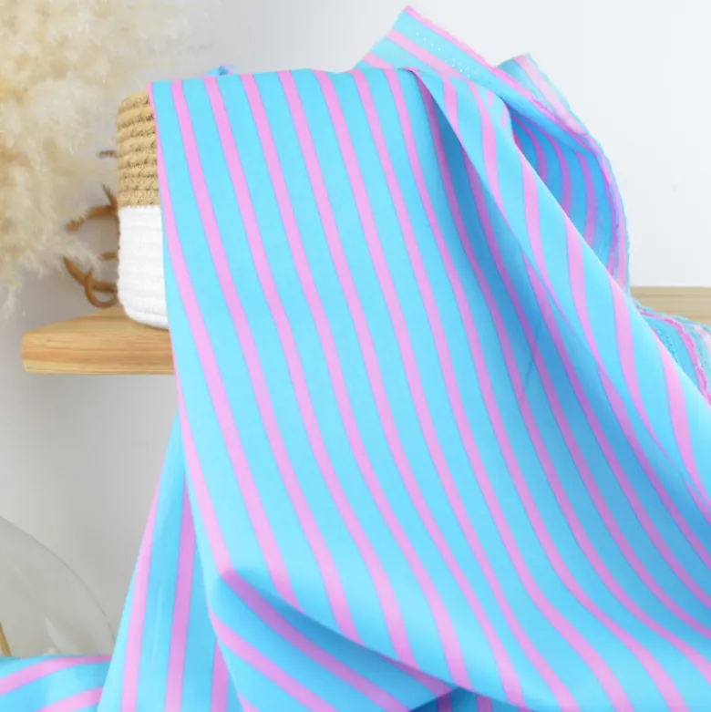 Tissu voile de coton Rudayan à rayures rose fond turquoise