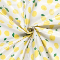 Toile cirée motif citrons fond blanc cassé
