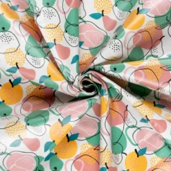 Toile cirée motif fruits fond blanc cassé