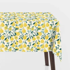 Toile cirée motif poires jaunes fond blanc cassé