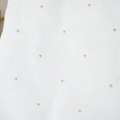 Voile de coton brodé marguerites fond blanc