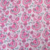 Voile de coton matelassée motif fleurs roses fuchsia