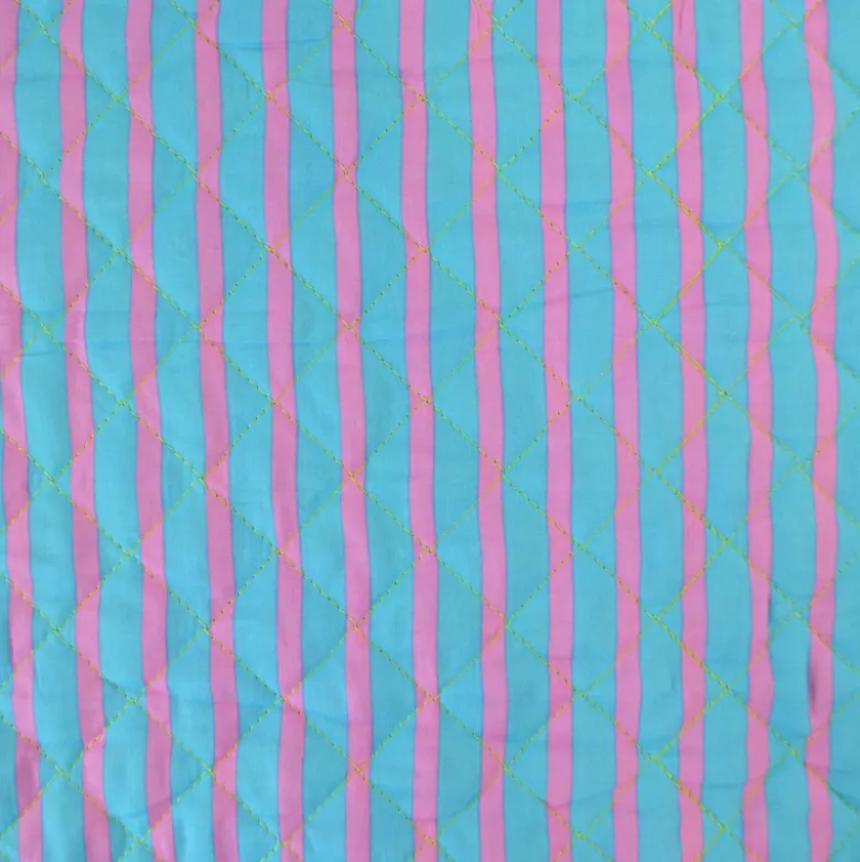 Voile de coton matelassée motif fleurs jaunes et rayures bleues