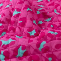 Voile de coton matelassée Ravika motif léopard fond rose fuchsia