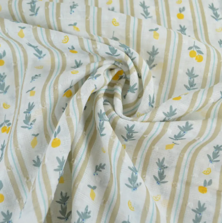 Voile plumetis rayures et citrons fond écru