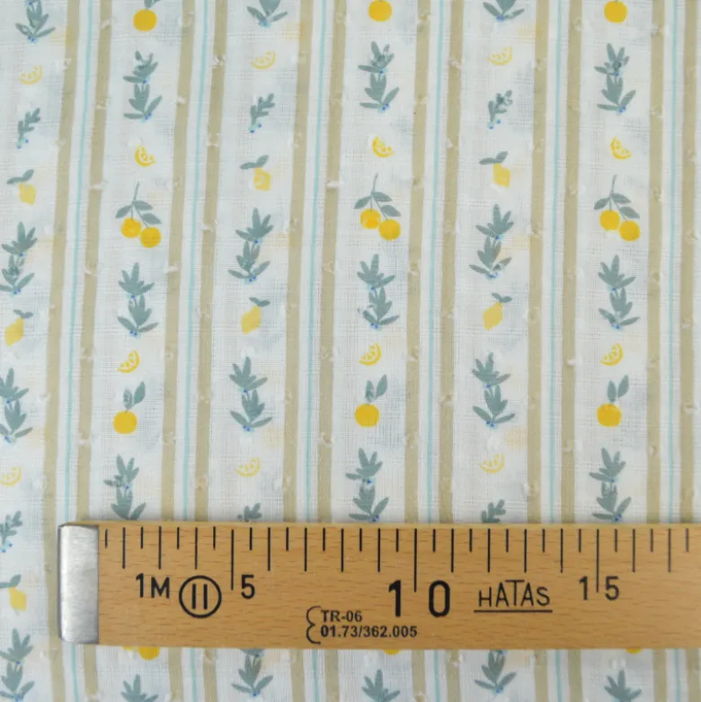 Voile plumetis rayures et citrons fond écru